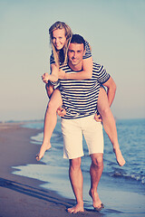 Image showing happy young couple have romantic time on beach