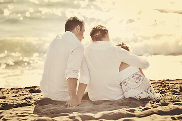 Image showing happy young  family have fun on beach