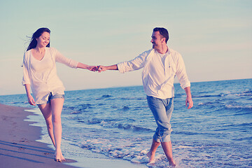 Image showing young couple  on beach have fun