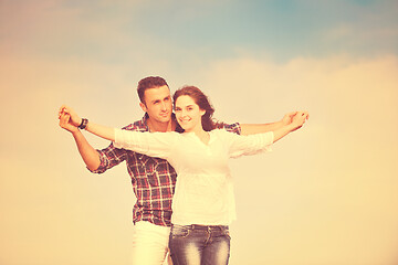 Image showing happy young couple have fun on beach