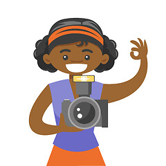 Image showing African-american photographer taking a photo.