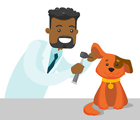 Image showing African-american veterinarian examining dog.