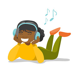 Image showing Young woman in headphones listening to music.