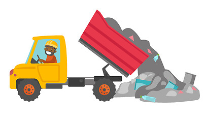 Image showing Worker and bulldozer at rubbish dump.