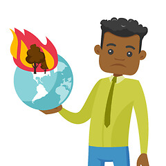 Image showing African man holding globe with forest in fire.