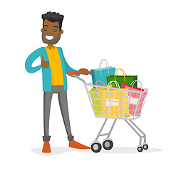 Image showing Young african-american man with shopping bags.