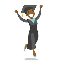 Image showing Young cheerful african-american graduate jumping.