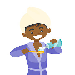 Image showing African woman with toothpaste and toothbrush.