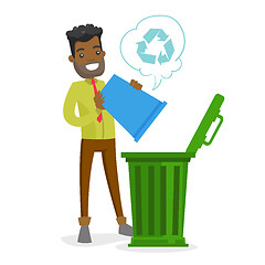 Image showing Young african man with recycle bin and trash can.