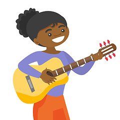 Image showing Young african-american artist playing guitar.
