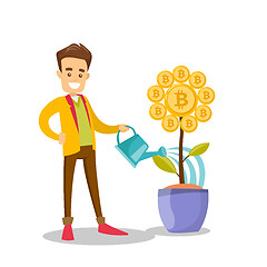 Image showing Businessman watering flower with bitcoin symbol