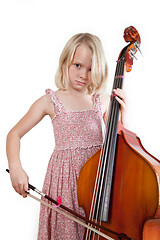 Image showing Portrait of a young teenager girl in studio with a cello