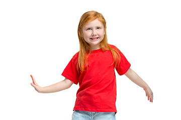 Image showing Full length portrait of cute little kid in stylish jeans clothes looking at camera and smiling