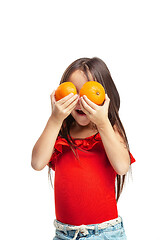 Image showing Full length portrait of cute little kid in stylish jeans clothes with orange