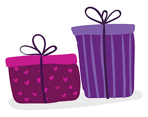 Image showing Two different sized rectangular boxes wrapped in colorful decora