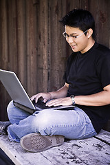 Image showing Asian college student with laptop