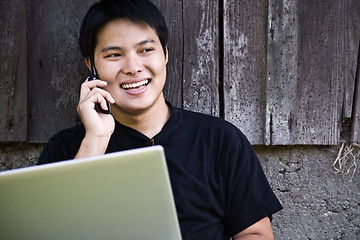 Image showing Asian student on the phone