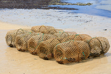 Image showing Typical malagasy fishing trap on beach