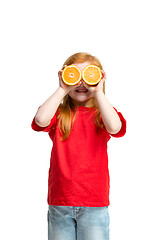 Image showing Full length portrait of cute little kid in stylish jeans clothes with orange