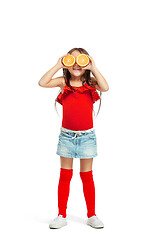 Image showing Full length portrait of cute little kid in stylish jeans clothes with orange