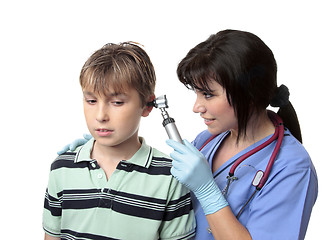 Image showing Doctor checking ears