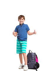 Image showing Full length portrait of cute little kid in stylish clothes looking at camera and smiling