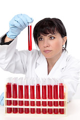 Image showing Scientist with test tubes