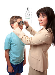 Image showing Optometrist with child