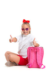 Image showing Full length portrait of cute little kid in stylish sunglasses looking at camera and smiling