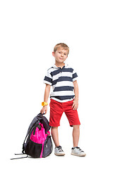 Image showing Full length portrait of cute little kid in stylish clothes looking at camera and smiling