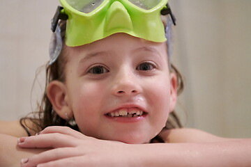 Image showing little girl with snorkel goggles