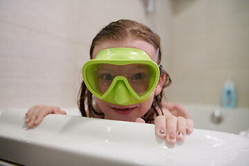 Image showing little girl with snorkel goggles