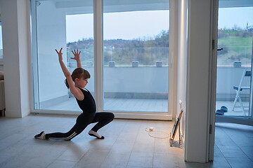 Image showing girl online education ballet class at home