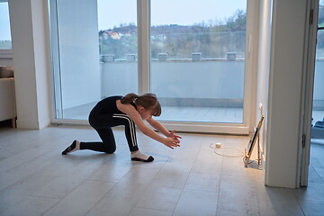 Image showing girl online education ballet class at home