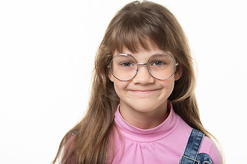 Image showing Portrait of a natural beautiful girl in glasses on a white background
