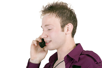 Image showing portrait of the young man, speaking by phone. Isolated