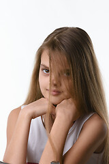 Image showing Beautiful girl with long blond hair covering part of the face