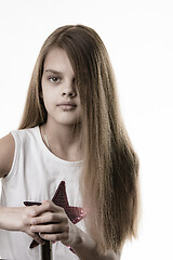 Image showing Partially bleached rub of a pretty girl with long hair