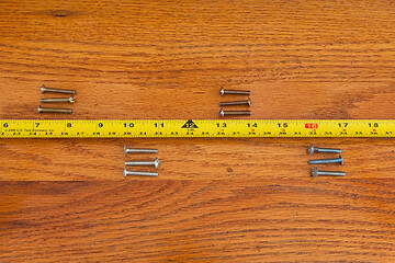 Image showing Screws and Tape Measure