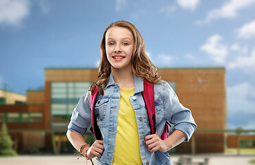 Image showing happy smiling teenage student girl with school bag