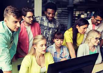 Image showing international students with computers at library