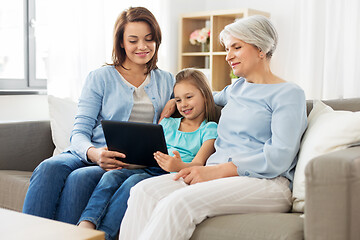 Image showing mother, daughter and grandmother with tablet pc