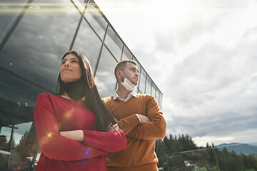 Image showing business team with protective medical mask