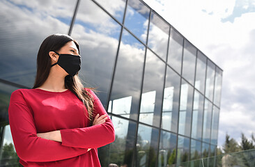 Image showing business woman portrait  with protective mask