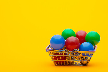 Image showing red, blue and green light bulbs in the consumer basket