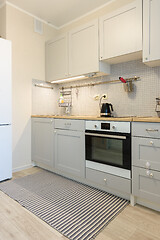 Image showing Interior of a modern kitchen with built-in appliances