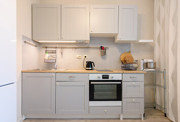 Image showing Classic kitchen with built-in appliances in the interior of the kitchen