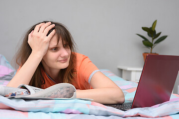 Image showing An unemployed girl is stressed, cannot find a job