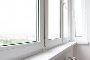 Image showing Plastic window sill on a balcony glazed with plastic windows