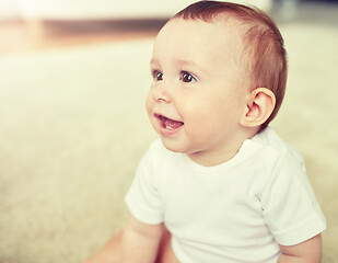 Image showing close up of happy little baby boy or girl at home